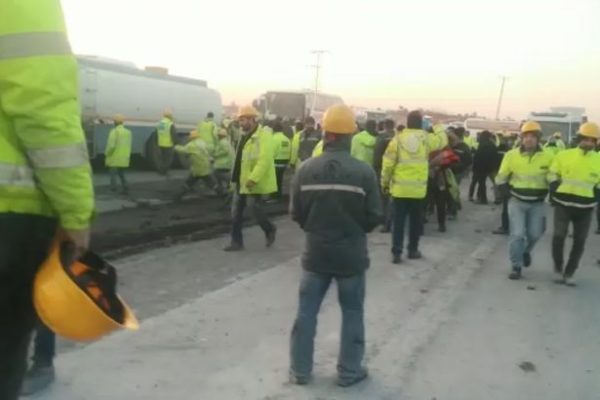 Workers protest poor conditions at construction of massive airport